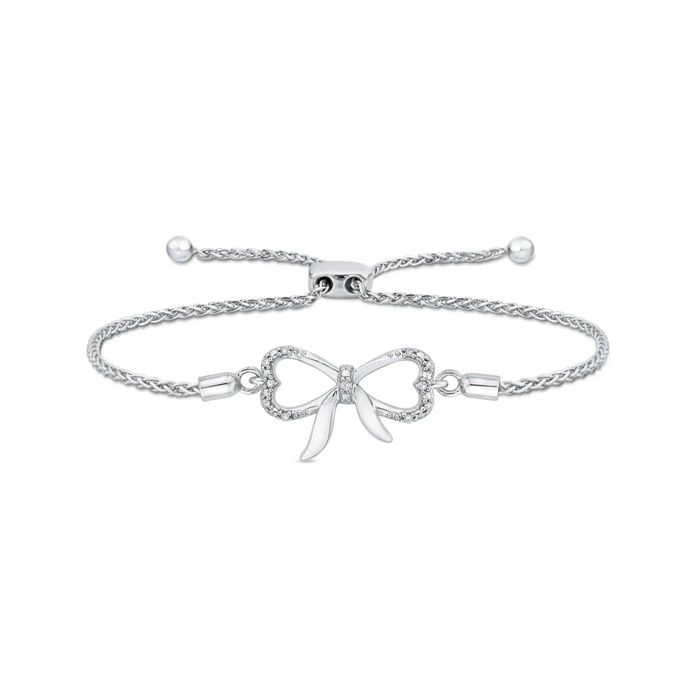 KATARINA Bow and Heart Shaped Infinity Diamond Tennis Bracelet (1/20 cttw)